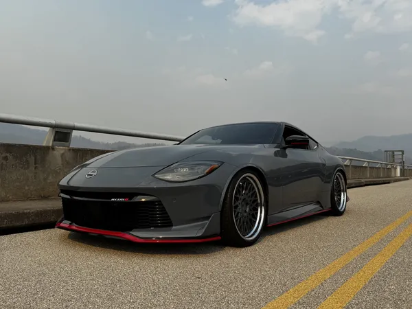 Gray Nissan Z Nismo on Fontana Dam, front view