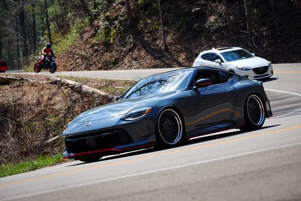 Gray Nissan Z carving a curve on the Tail of the Dragon